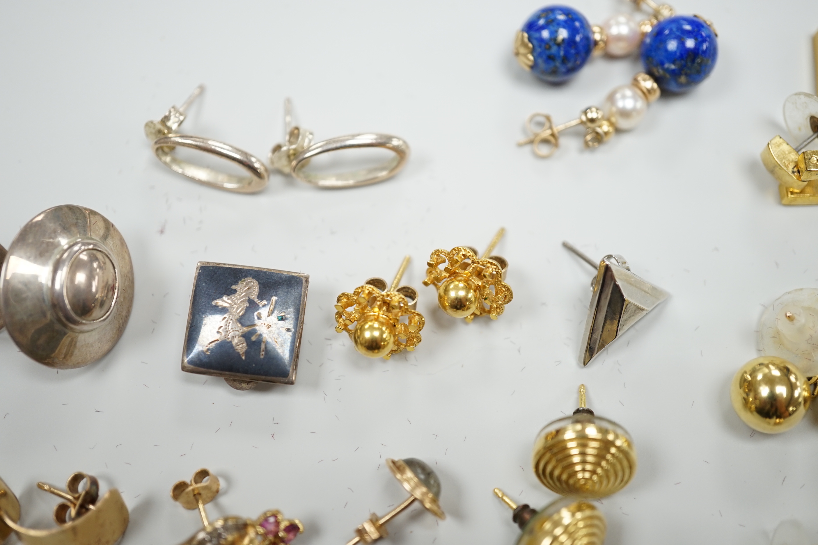 A modern pair of 9ct gold, gold, ruby and diamond earrings, boxed and nine other assorted pairs of earrings and two odd earrings.